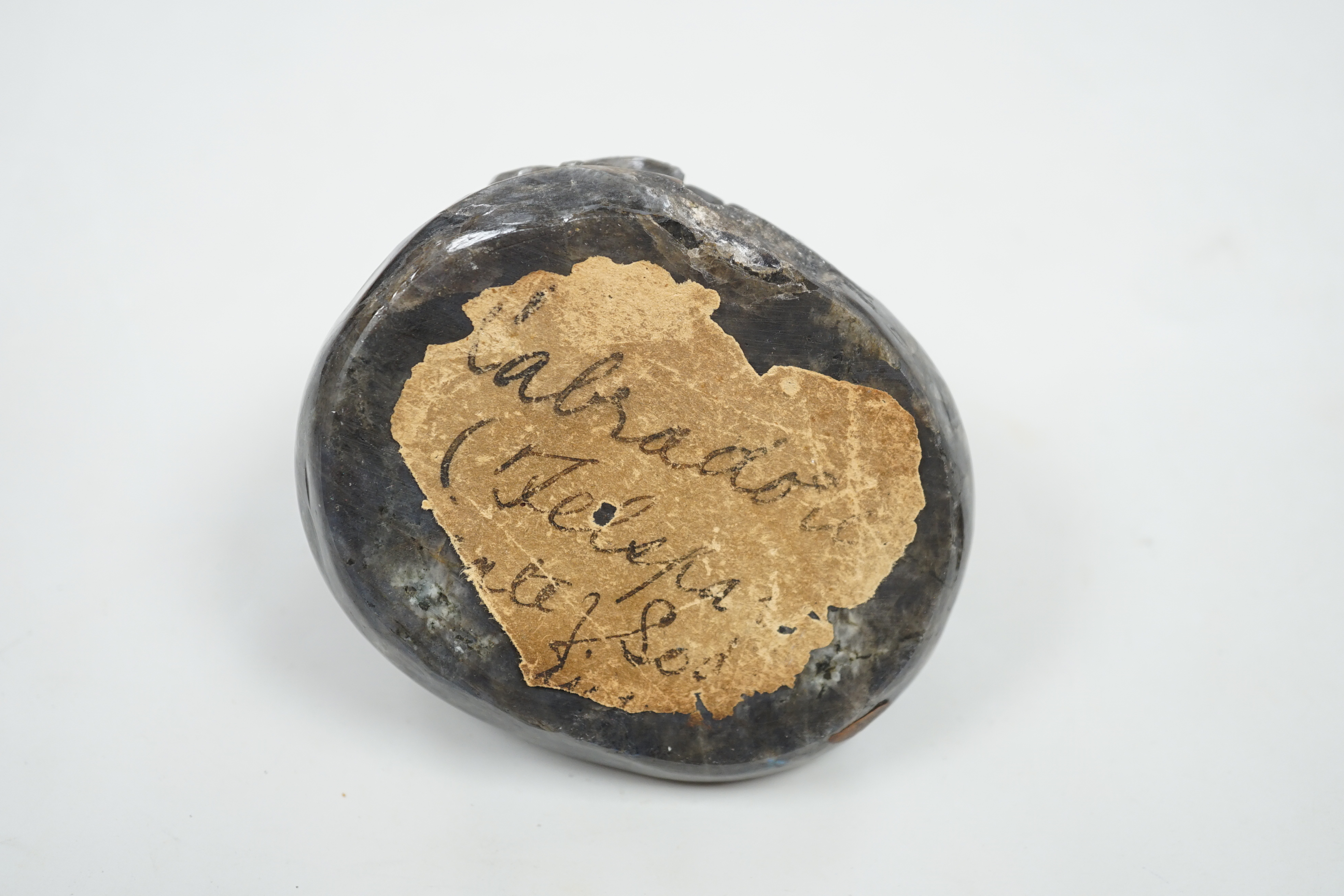 A carved labradorite paperweight with the head of Medusa, After the Antique, 8cm